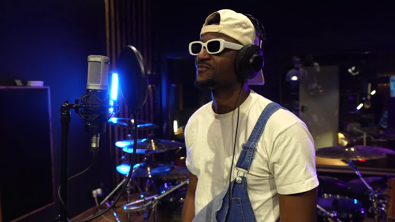 Man performing in a recording studio