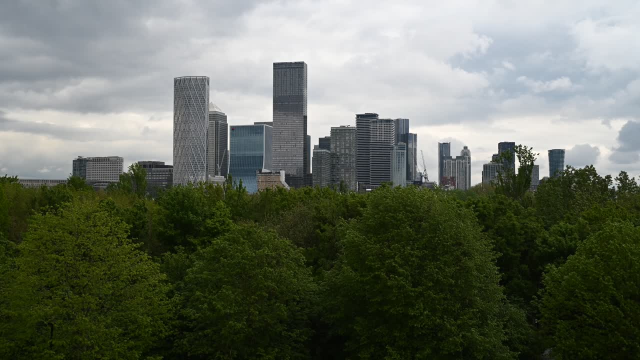 Canary Wharf Skyline from Across a Green Space