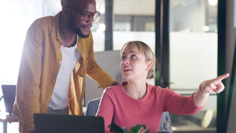 corporate black man, woman and point at computer