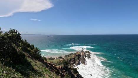 a serene view of waves crashing against rocks