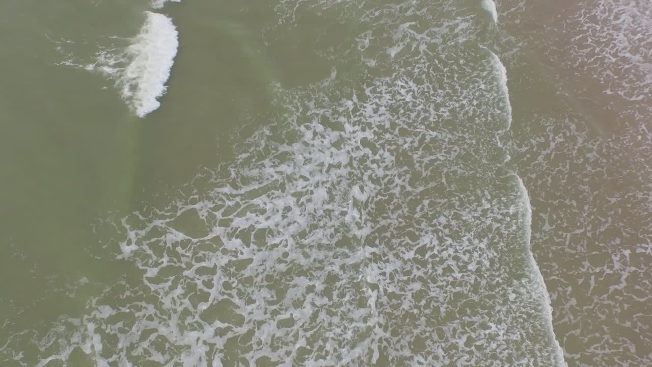 Aerial View of Waves and Beach