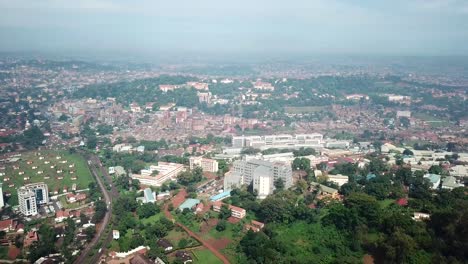 cityscape of kempala, largest city and the capital of uganda, during sunny day - birds eye view