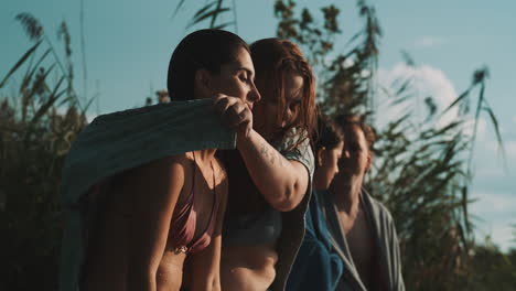 friends relaxing by the water