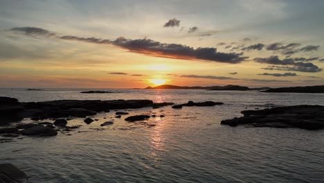 calm and peaceful sunset on deserted beach in ireland