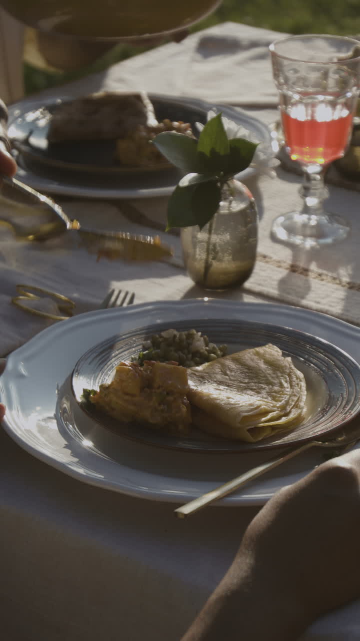 Serving food at an outdoor meal