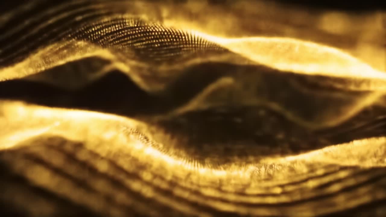 Golden wave patterns flow smoothly, creating an abstract visual effect.