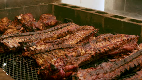 cooked pigs on a bbq pit