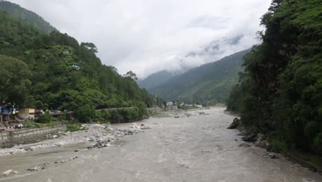 himalaya mountainous river ganges flowing through himalaya villages - cities in uttarakhand, india