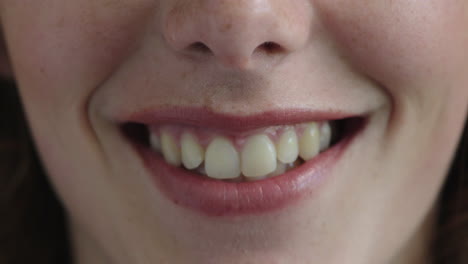 close up woman mouth smiling happy showing teeth dental health