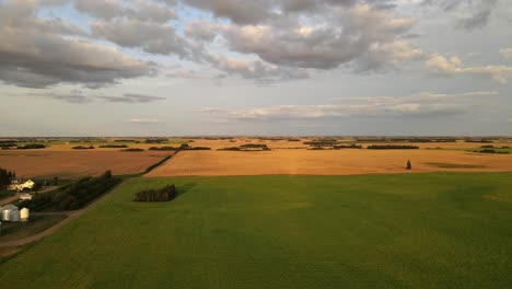 drone flying by a family operated grain farm in rural alberta