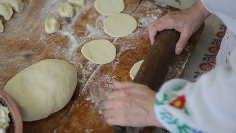 cook making dumplings