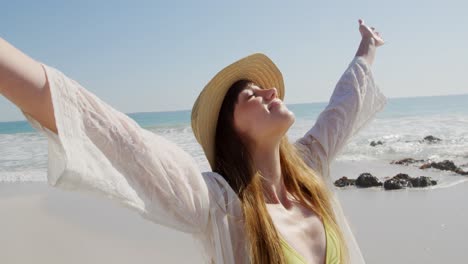 young woman by the sea