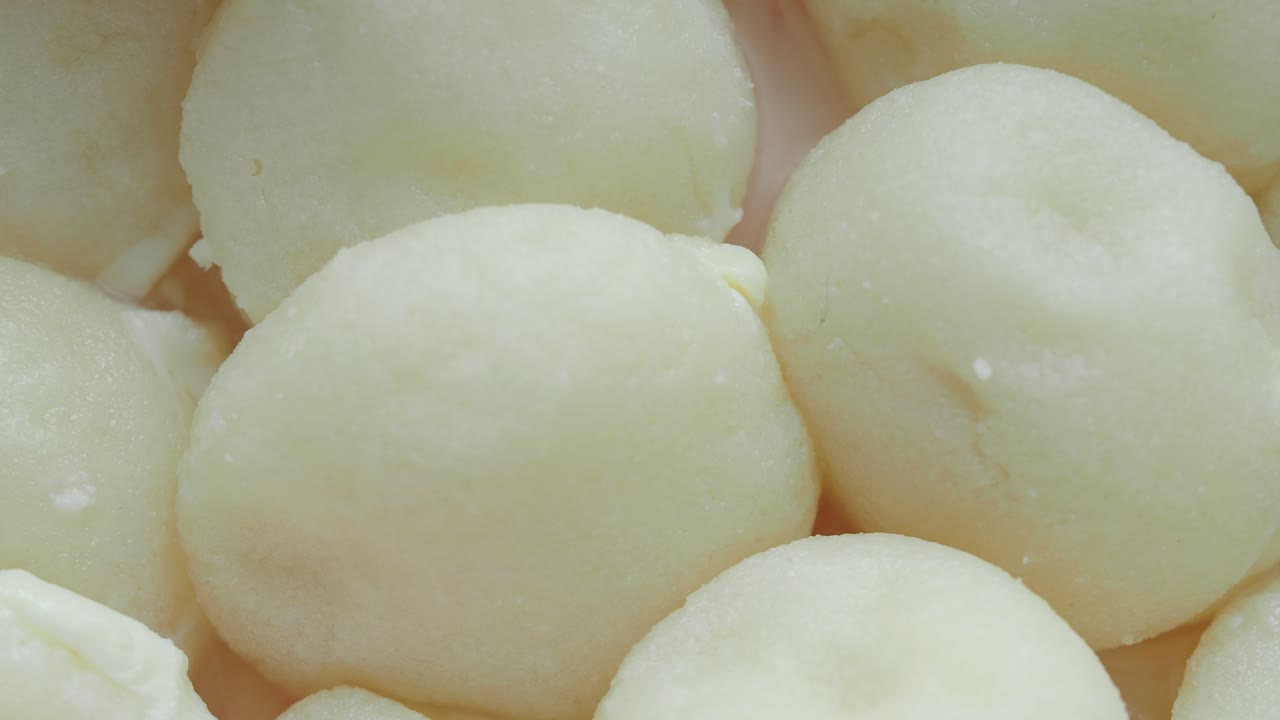 Close-up of Soft, Light-Colored Round Desserts