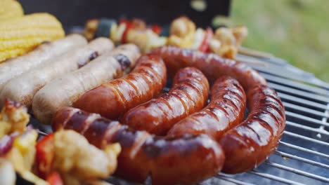 Sausages-and-vegetables-cooking-on-grill