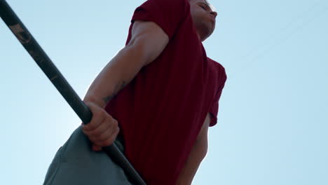 man doing pull ups outdoor