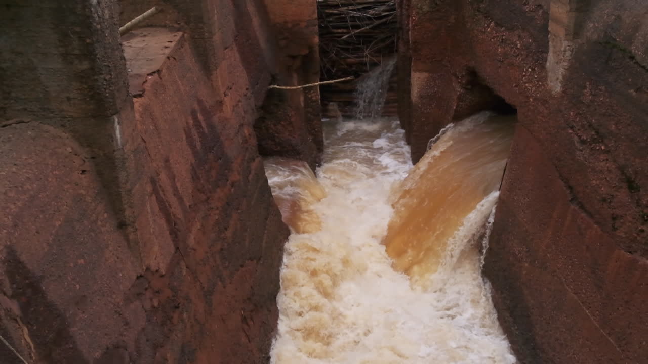 Fast-flowing water through a canal