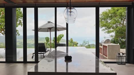 luxury stone bench tops in private villa kitchen with cinematic slide