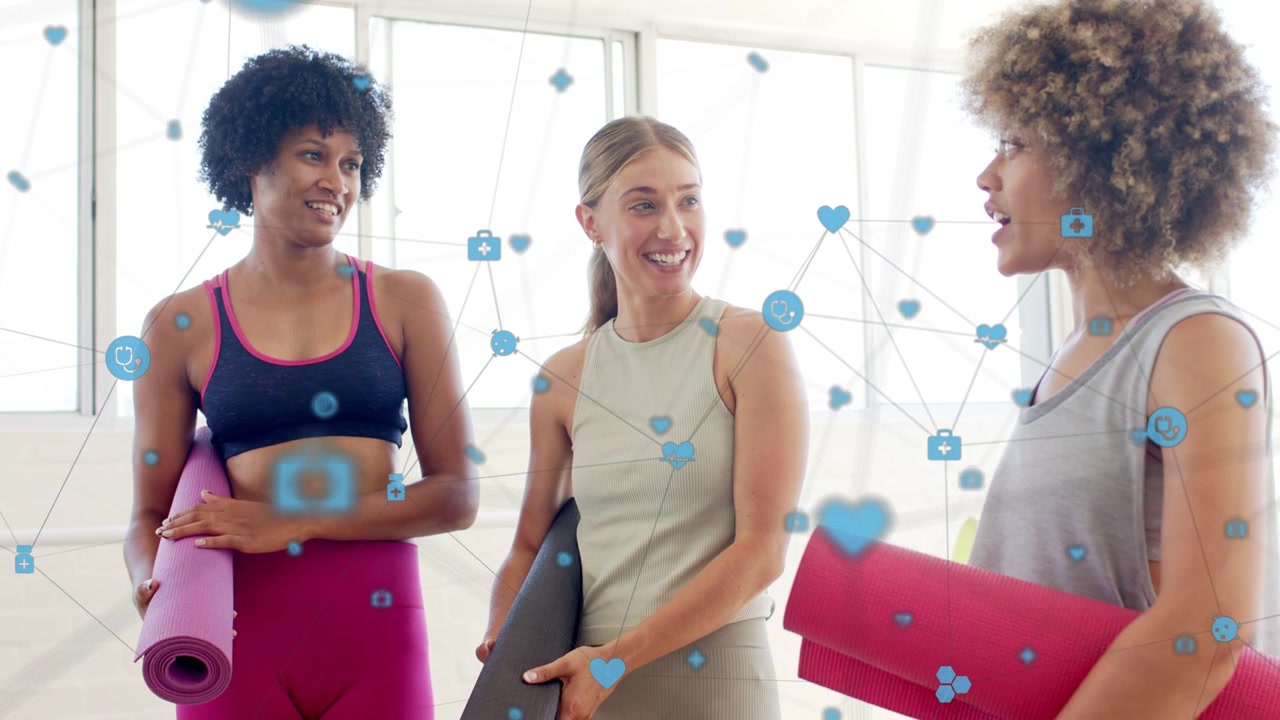 Vertical video: Right woman talking starting yoga chat trio with mats blue icons drifting over them