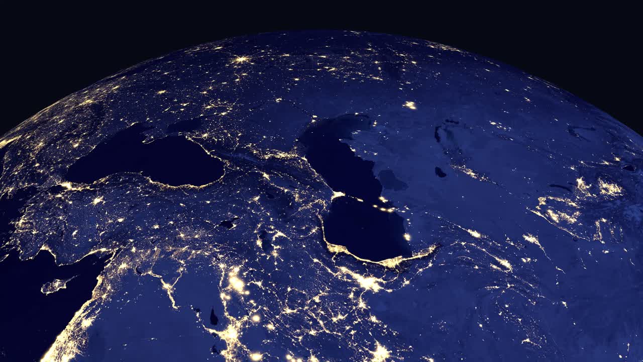Earth rotates and zooms into a night view of Tbilisi Georgia with regional country labels