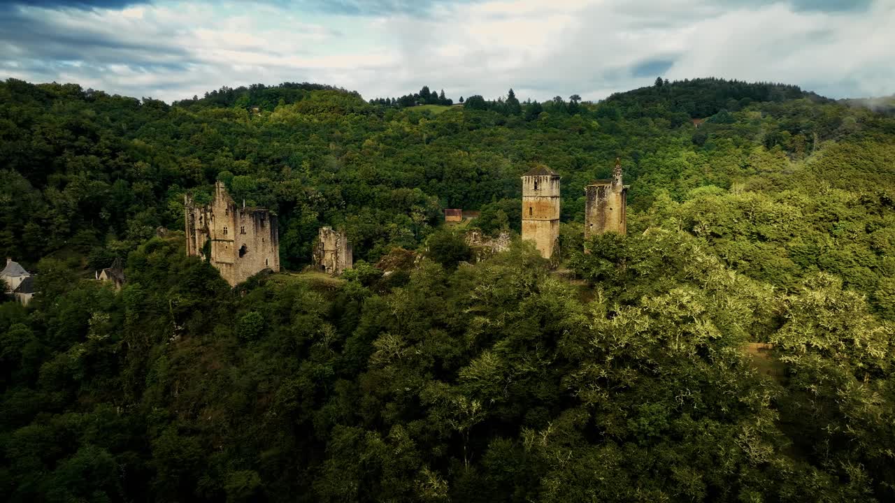 in the middle of a forest, a ruined castle surrounded by a forest in a valley