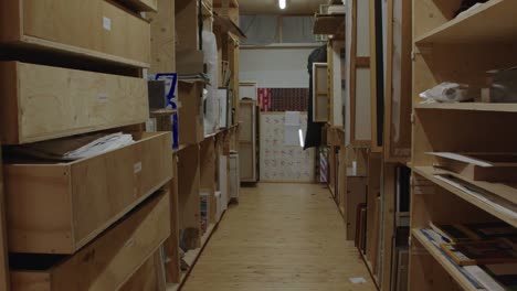 closet hallway room full of wooden drawers in an art school