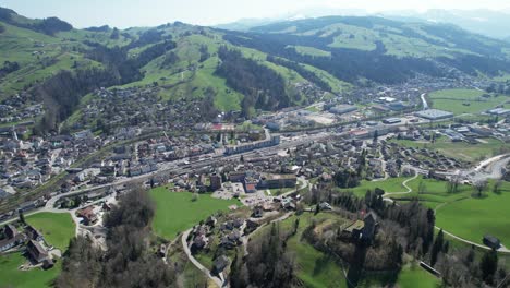 stunning city wattwil in the alps in switzerland, aerial forward shot