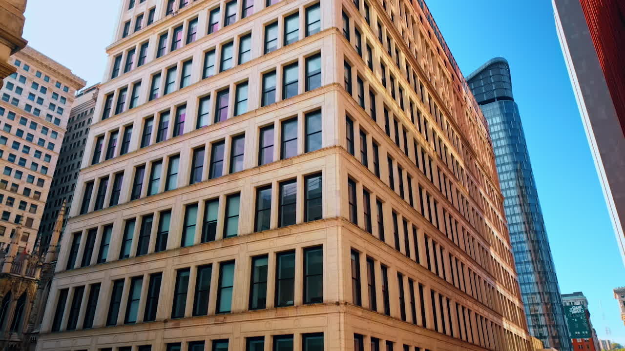 Multi-storied building with lots of thin windows. Low angle view. Architecture of Pittsburg, Pennsylvania, USA