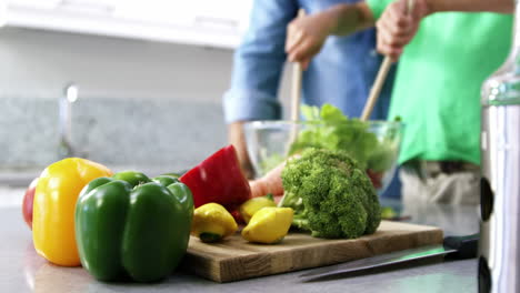 Close-up-on-people-cooking-vegetables