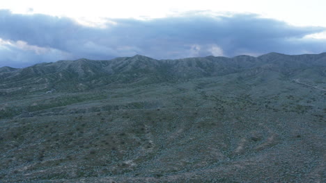 Drone-aerial-landscape-of-Granite-Hills-mountain-range-environment-nature-wind-farm-sustainability-San-Diego-County-California-America-USA