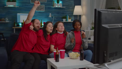 excited multiracial friends celebrating football championship support game team