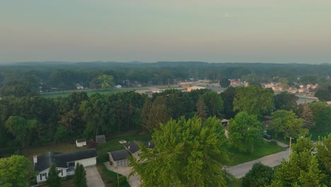 early summer sun rise over a small town