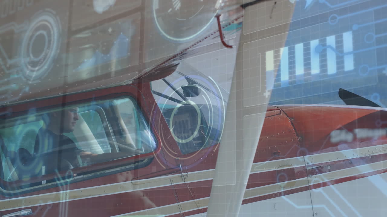 male pilot operating red prop plane cockpit, showing control yoke with HUD graphics for aviation