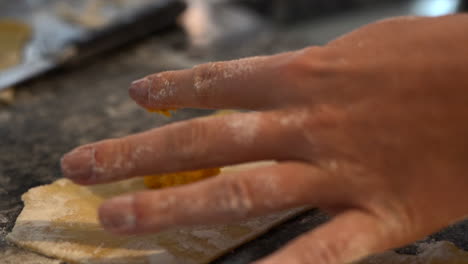 making homemade ravioli, filling pasta