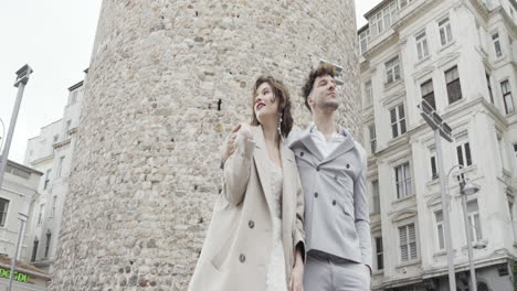 couple posing outdoors