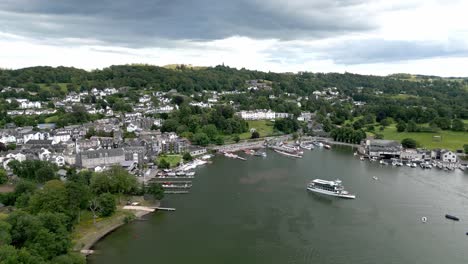 aerial footage of bowness-on-windermere a victorian, sprawling tourist town on the shore of windermere lake