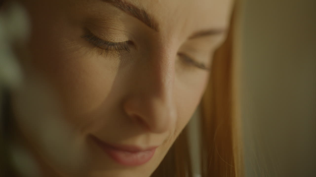 Close-Up Shot of Pensive Woman's Face