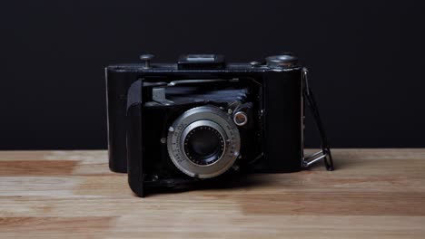 old vintage analog camera on a table