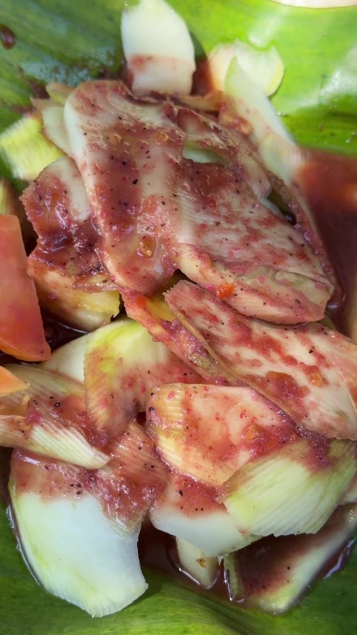 Close-up of Spicy Fruit Salad Served on a Banana Leaf