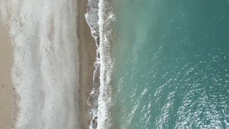 Person-walking-along-Pissouri-Beach,-Cyprus-island