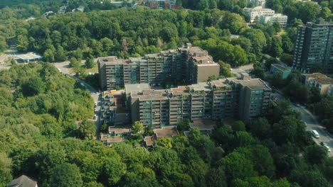 establishing drone shot of emmertsgrund neighborhood and brown buildings during the day in heidelberg, state of baden-wurttemberg, germany