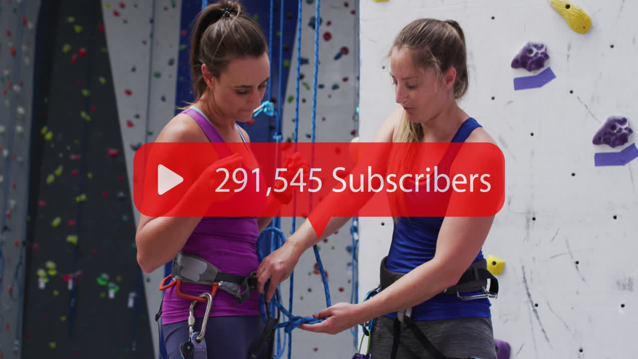 animación del icono de los medios sobre dos mujeres caucásicas en la pared de escalada