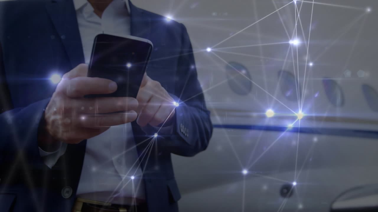 Uomo maturo che tocca il telefono vicino alla fusoliera, con nodi che si raggruppano attorno al telefono e mostrano collegamenti che si muovono verso destra