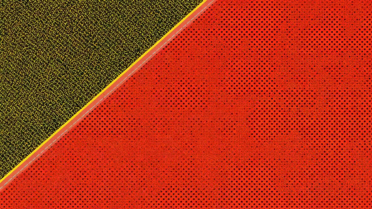 Sliding camera bringing red perforated panel and glossy gold seam into view in macro, showing green