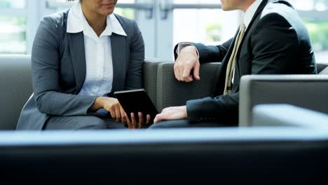 ambitious multi ethnic businessman and businesswoman in meeting