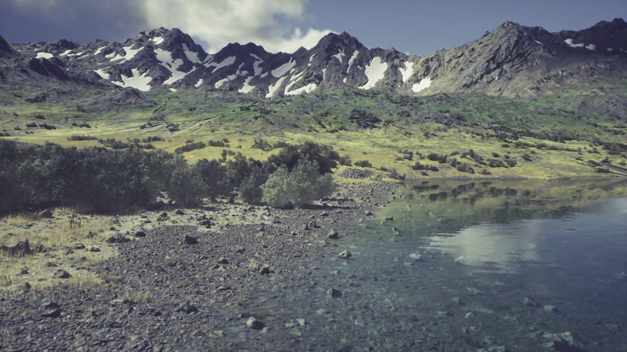 Serene highland lake with scatterings of rocks and gentle reflections