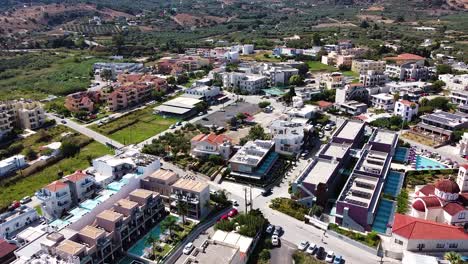 panoramic view of crete resort town, aerial