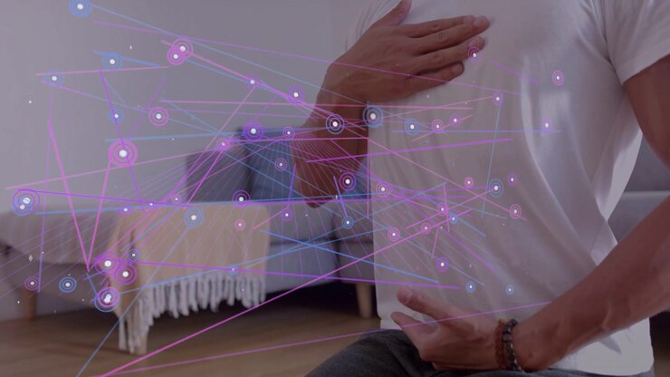 Man kneeling mat starting breath, moving hands to chest, purple network densifying for health