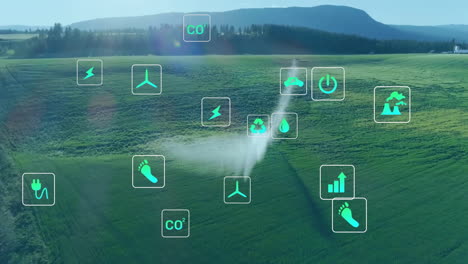 animación de iconos de ecología sobre el paisaje con rociador de agua en el campo