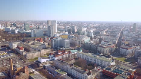 Drone-flight-over-the-campus-of-the-Technical-University-of-Berlin-with-a-view-of-the-Tiergarten,-Bahnhof-Zoo,-Straße-des-17