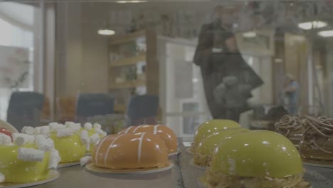 colorful desserts displayed in a cafe